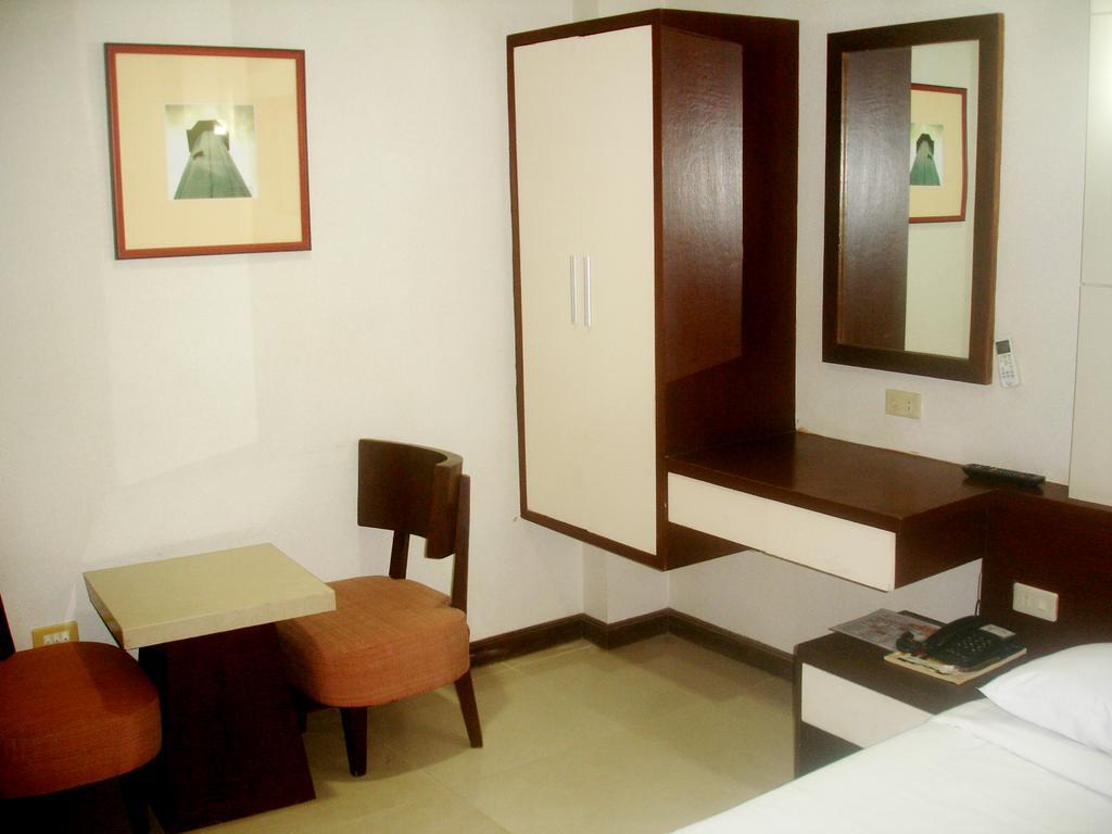 Roxas Midtown Hotel Quarto foto
